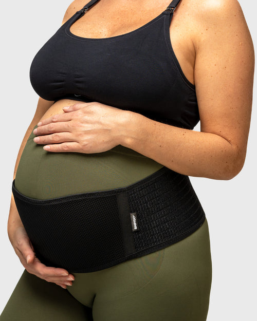 pregnant woman wearing support band