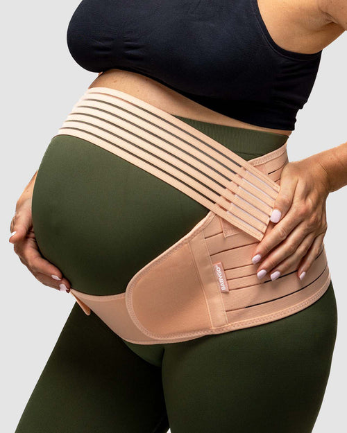 pregnant woman wearing support belt