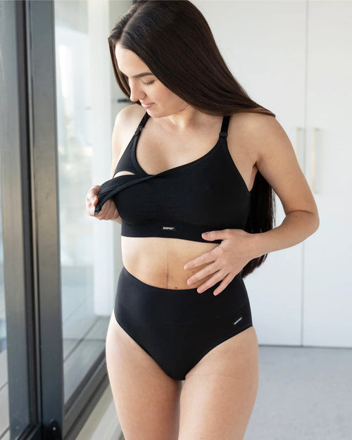 woman wearing postpartum underwear