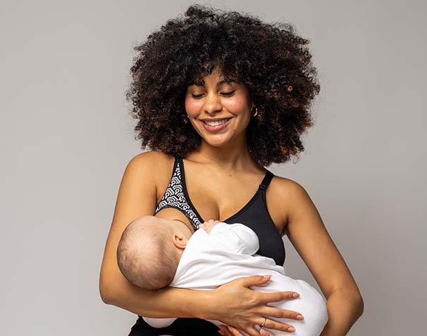 Women wearing the BABYGO® Sensory Bra for breast feeding her baby