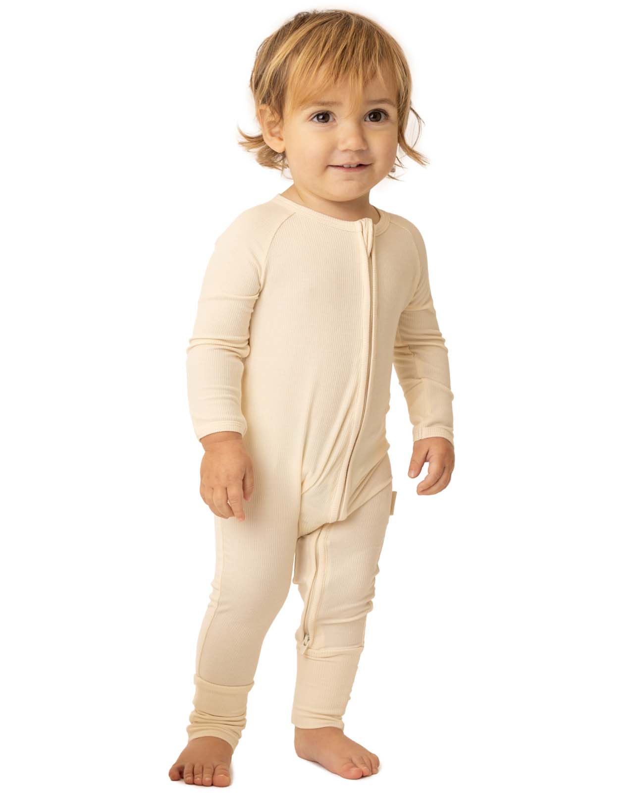 baby wearing ivory baby grow
