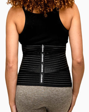 woman wearing postpartum support belt