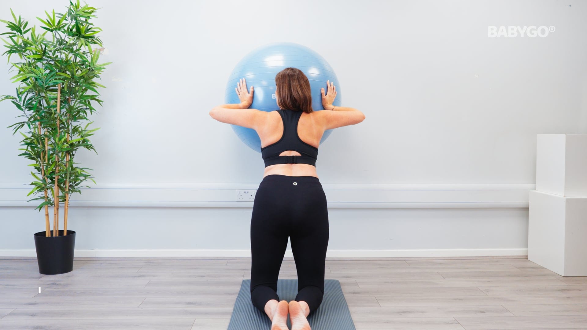 Kneeling Wall Ball Push Up – Birthing Ball exercise