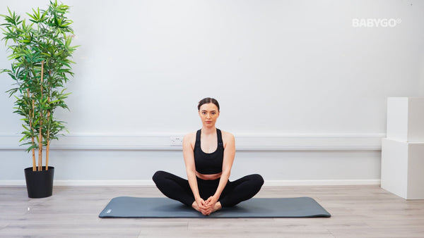 Seated Cross Leg Hip Flex – Birthing Ball exercise