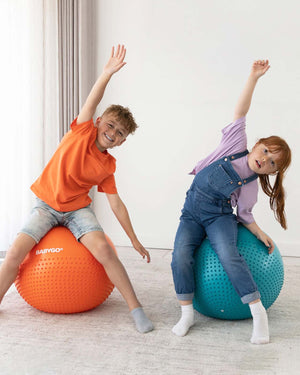 children on sensory exercise balls