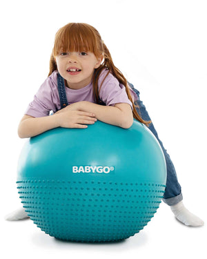 child on sensory exercise ball