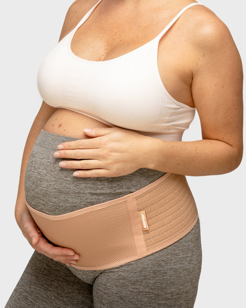 pregnant woman wearing support band