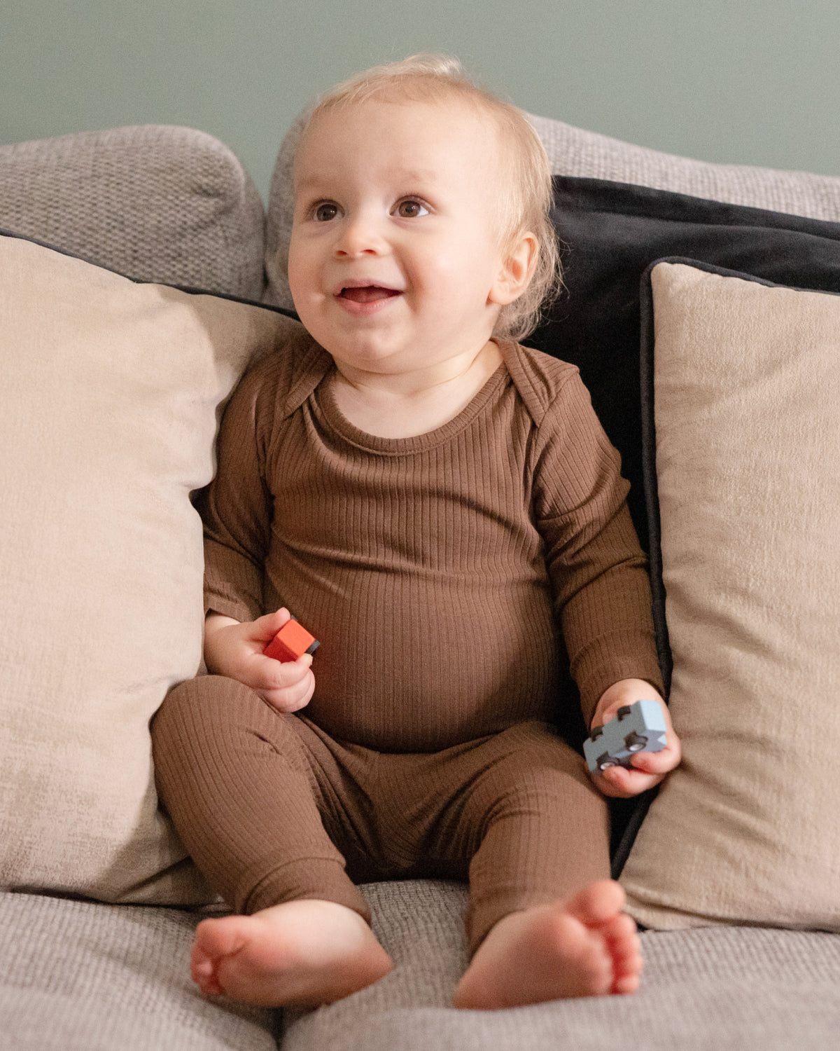 Baby wearing a mocha ribbed long sleeve bodysuit and leggings set, view 2