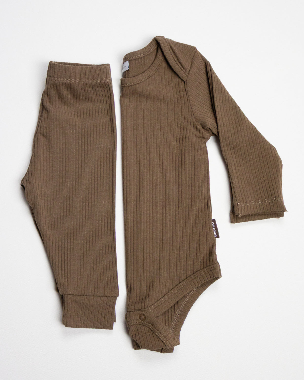 Baby wearing a mocha ribbed long sleeve bodysuit and leggings set, view 7