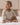 Baby wearing long sleeve bodysuit and leggings sets, twin pack in mocha and oatmeal, view 2