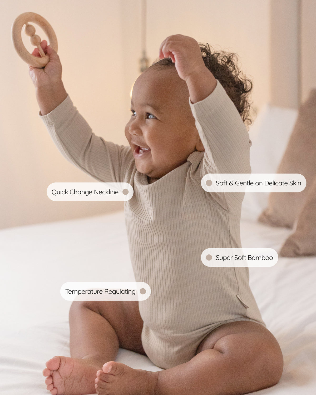 Baby wearing long sleeve baby bodysuits, 2 pack in mocha and oatmeal, view 4