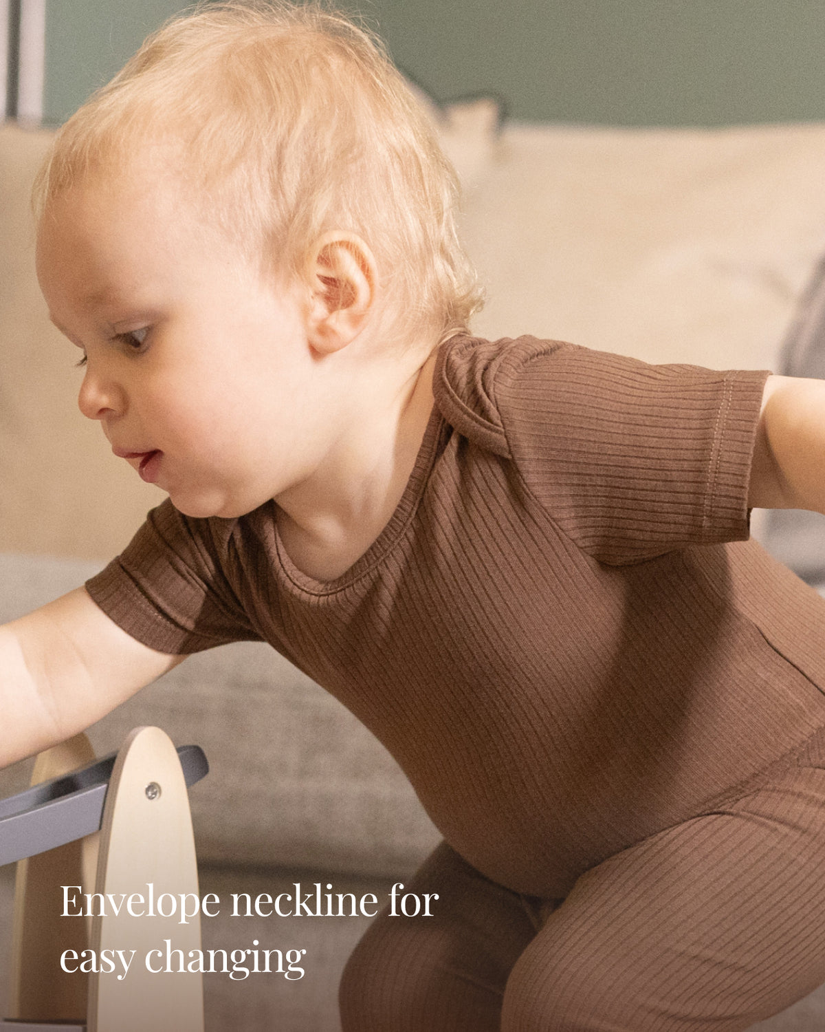 Baby wearing short sleeve bodysuit and leggings sets, twin pack in mocha and oatmeal, view 5
