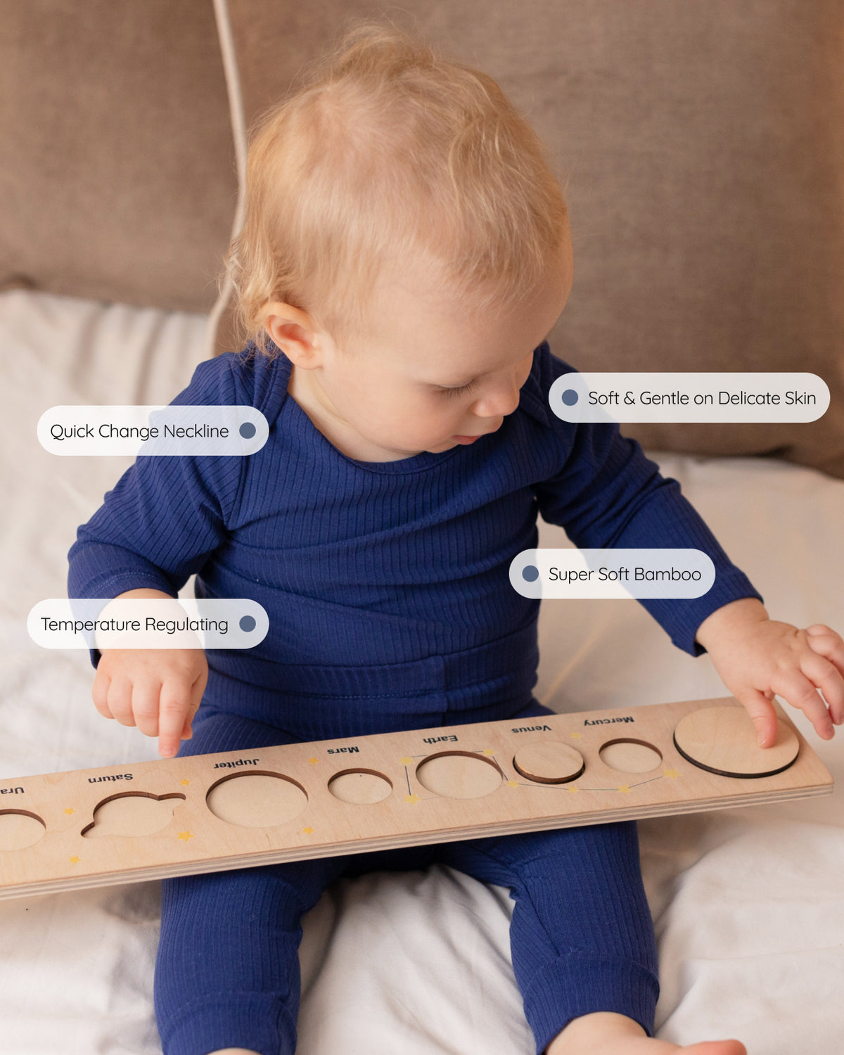 Navy ribbed bamboo long sleeve bodysuit, features