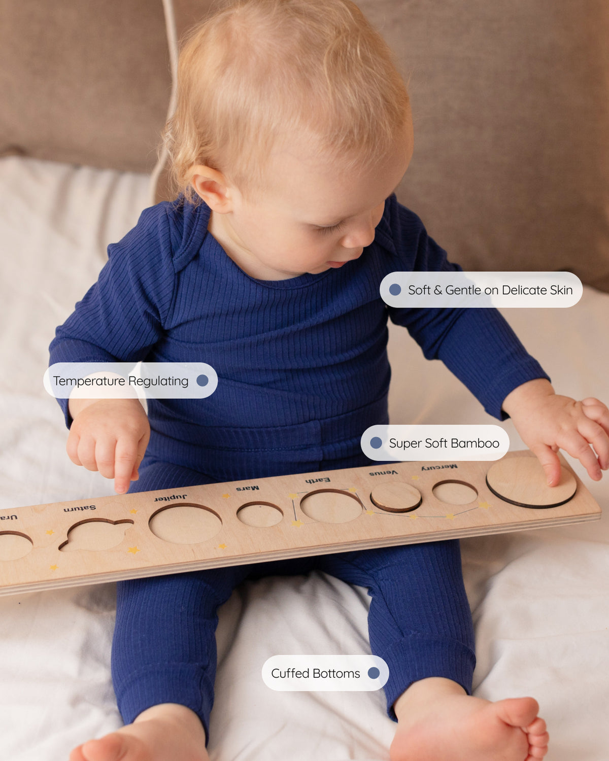 Baby wearing a navy ribbed long sleeve bodysuit and leggings set, view 4