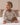 Baby wearing a oatmeal ribbed long sleeve bodysuit and leggings set, view 2