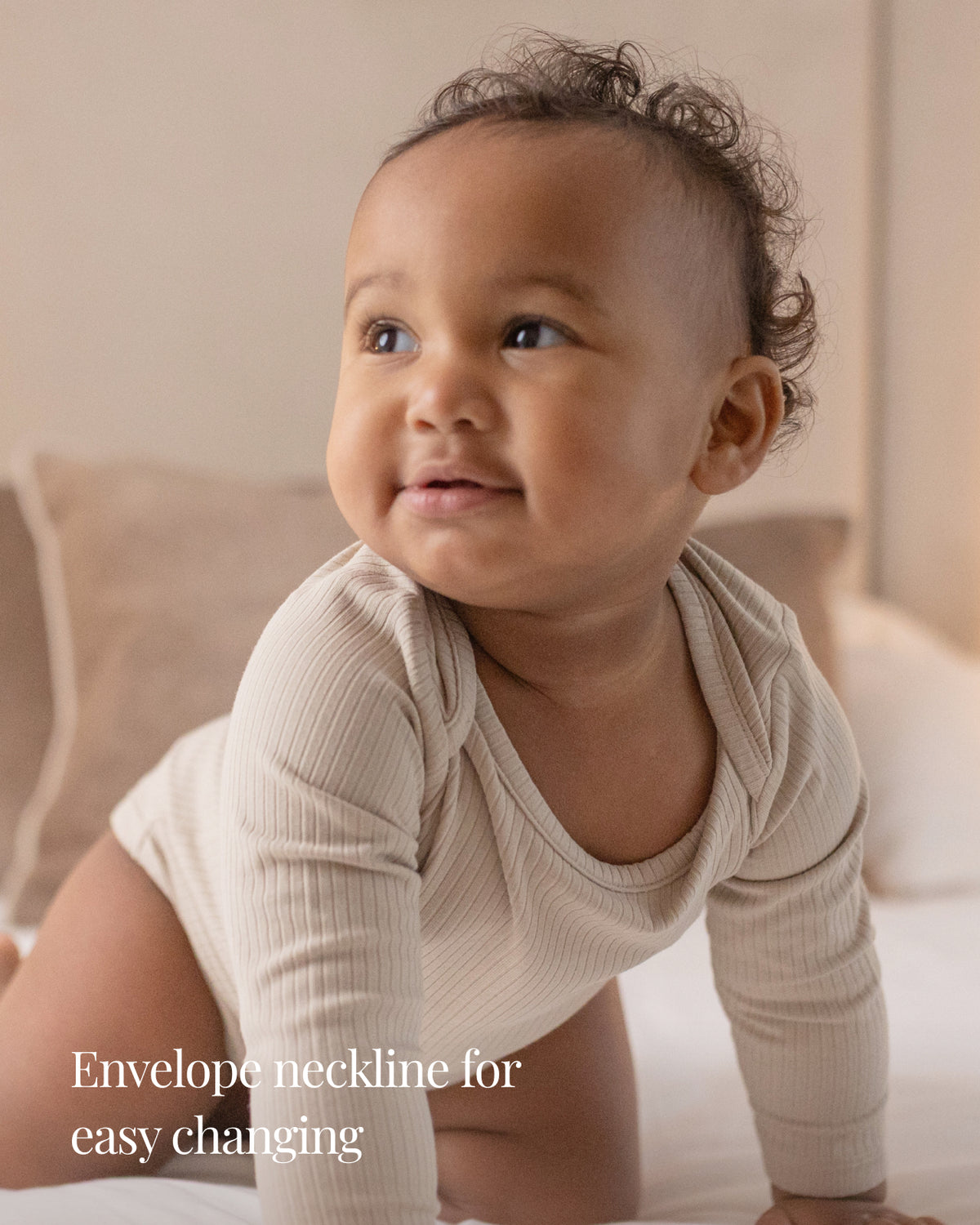 Baby wearing a oatmeal ribbed long sleeve bodysuit and leggings set, view 3