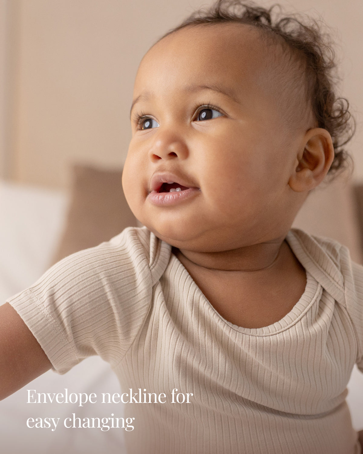 Baby wearing a oatmeal ribbed short sleeve bodysuit and leggings set, view 3