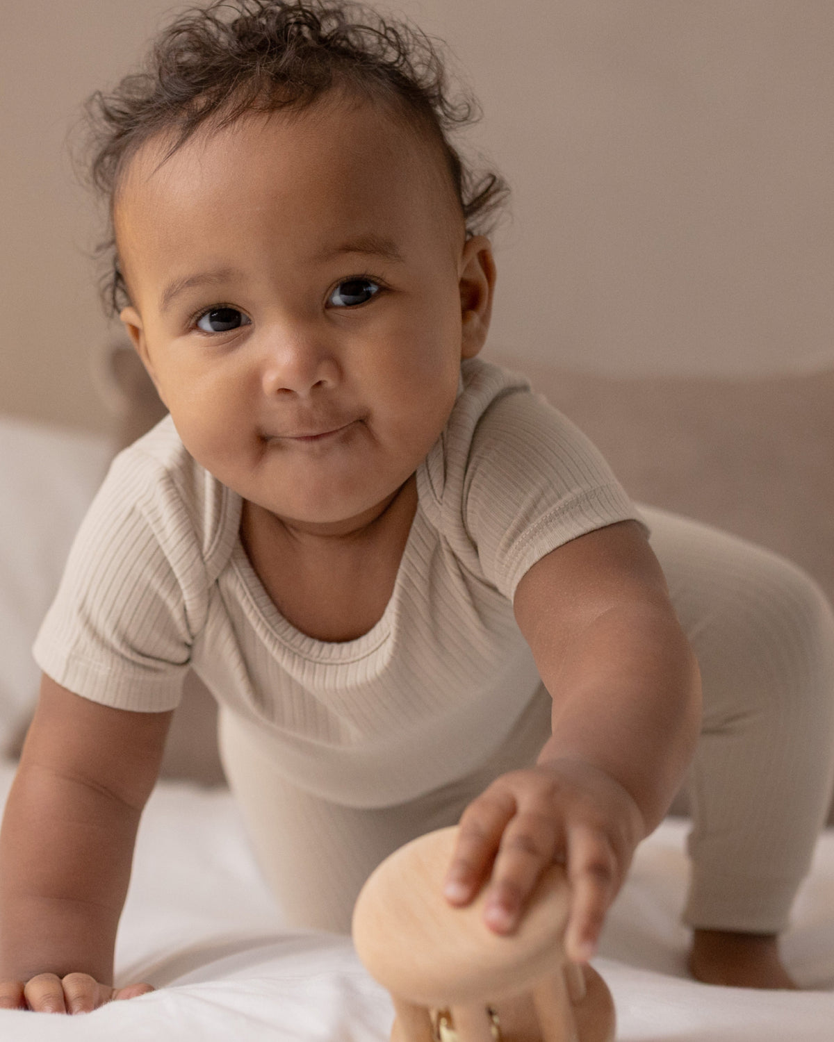 Baby wearing a oatmeal ribbed short sleeve bodysuit and leggings set, view 6