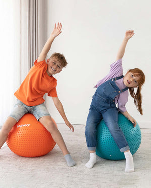 kids on sensory exercise balls