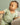 Baby wearing a sage ribbed short sleeve bodysuit and leggings set, view 3