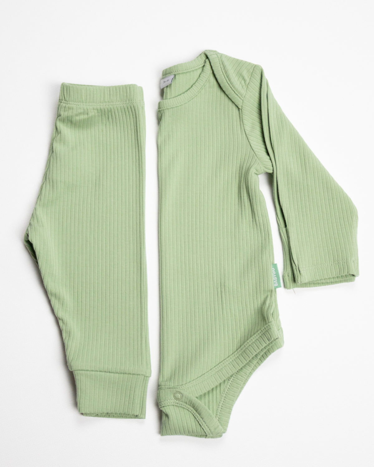 Baby wearing a sage ribbed long sleeve bodysuit and leggings set, view 7