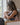 Mum breastfeeding her baby in the BABYGO Support+ Maternity Bra