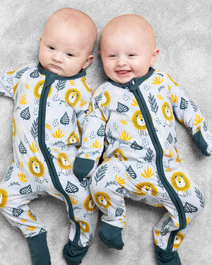 twins wearing lion baby grows
